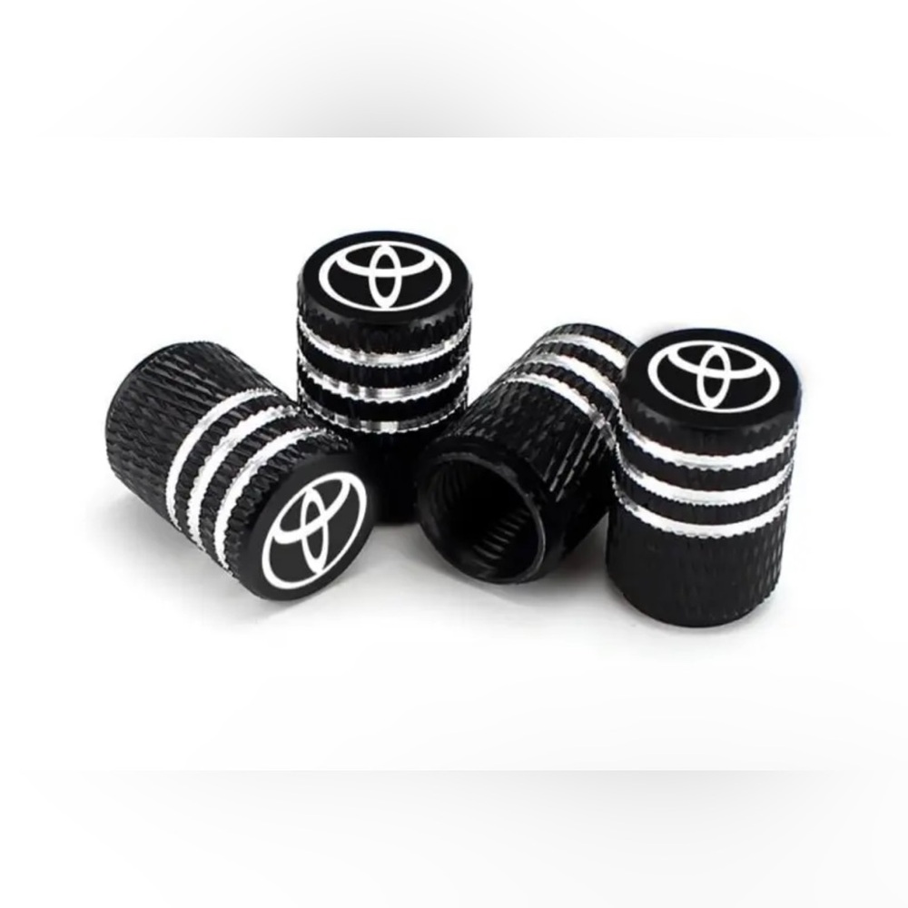 NWT 4PC Toyota Logo Tire Valve Caps